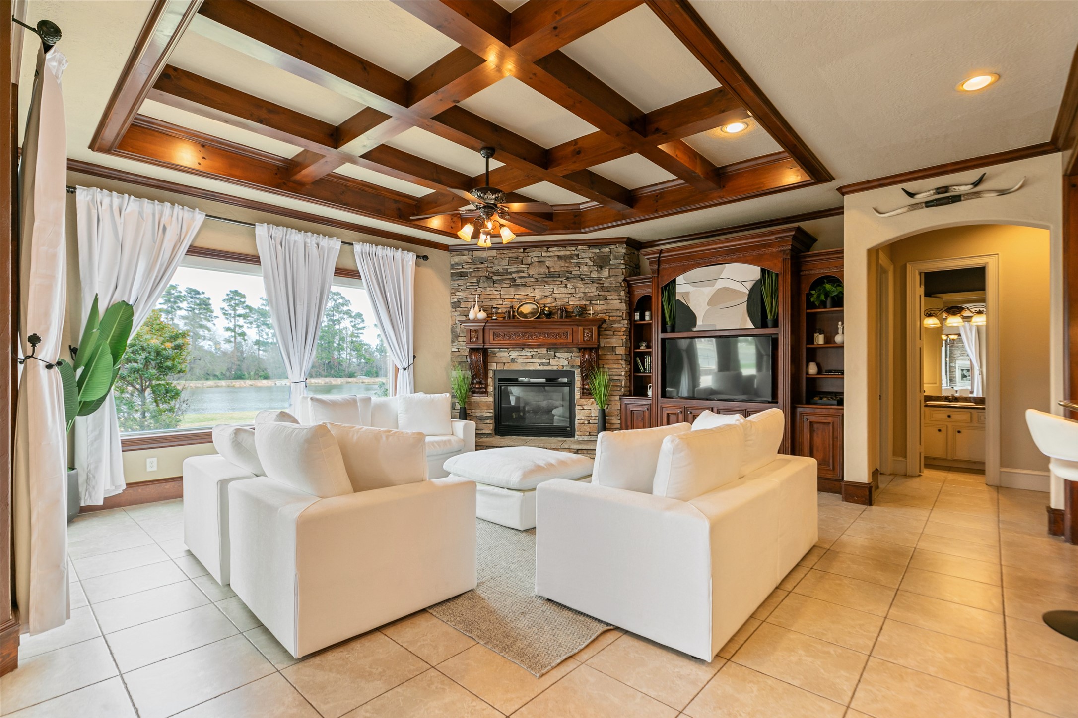 22 Post Shadow Estate Drive Spring, TX 77389 - Photo 26 of 50 Light fills this gorgeous den with large windows overlooking the backyard oasis
