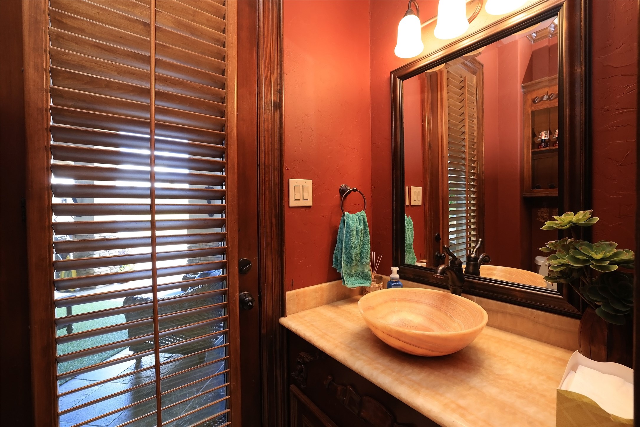 22 Post Shadow Estate Drive Spring, TX 77389 - Photo 27 of 50 a bathroom with a granite countertop sink and a mirror