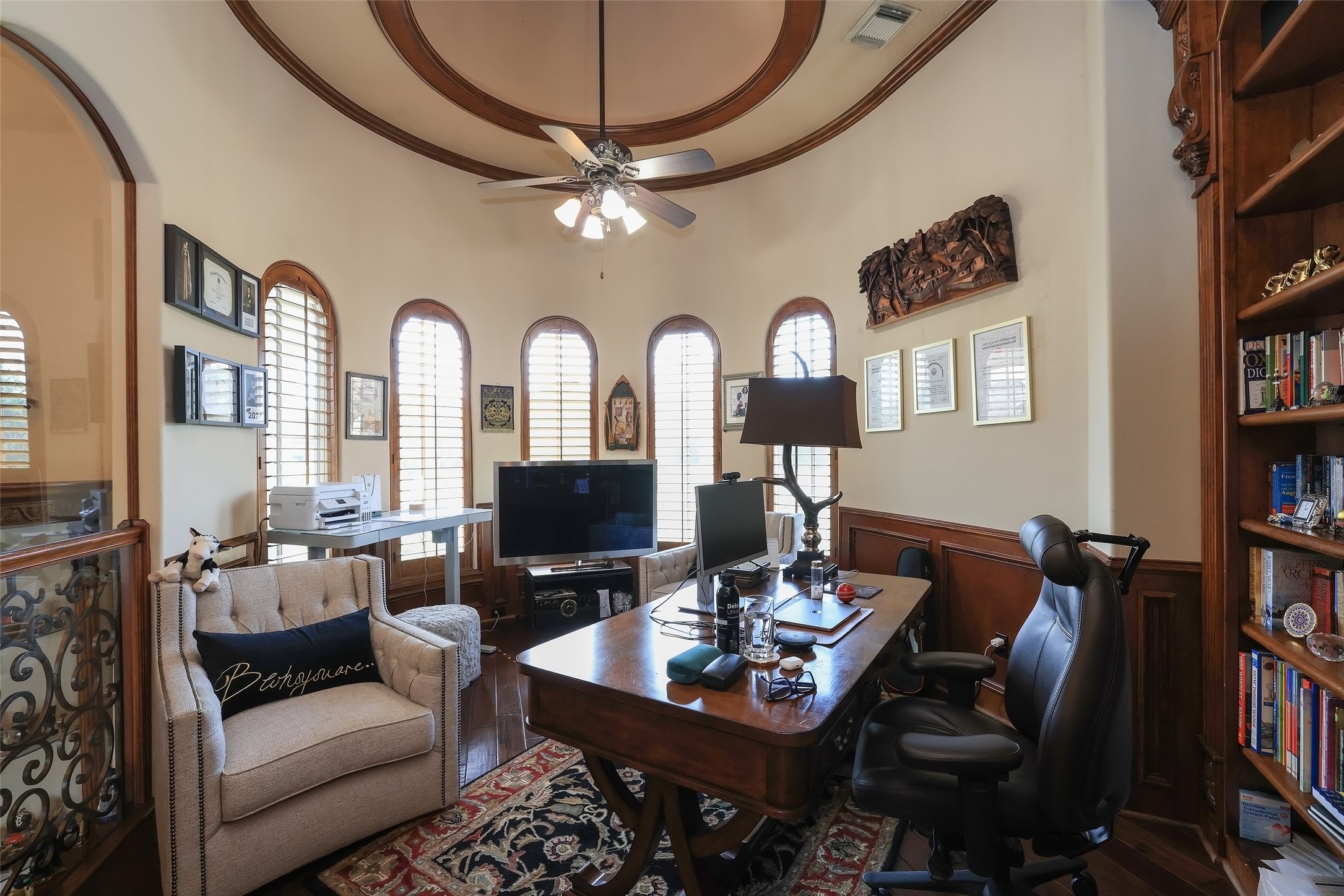 22 Post Shadow Estate Drive Spring, TX 77389 - Photo 28 of 50 a living room with furniture a bookshelf and a flat screen tv