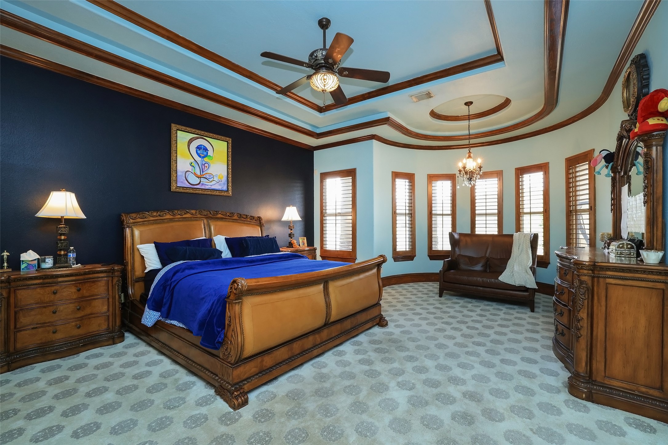 22 Post Shadow Estate Drive Spring, TX 77389 - Photo 29 of 50 a bedroom with a bed and ceiling fan