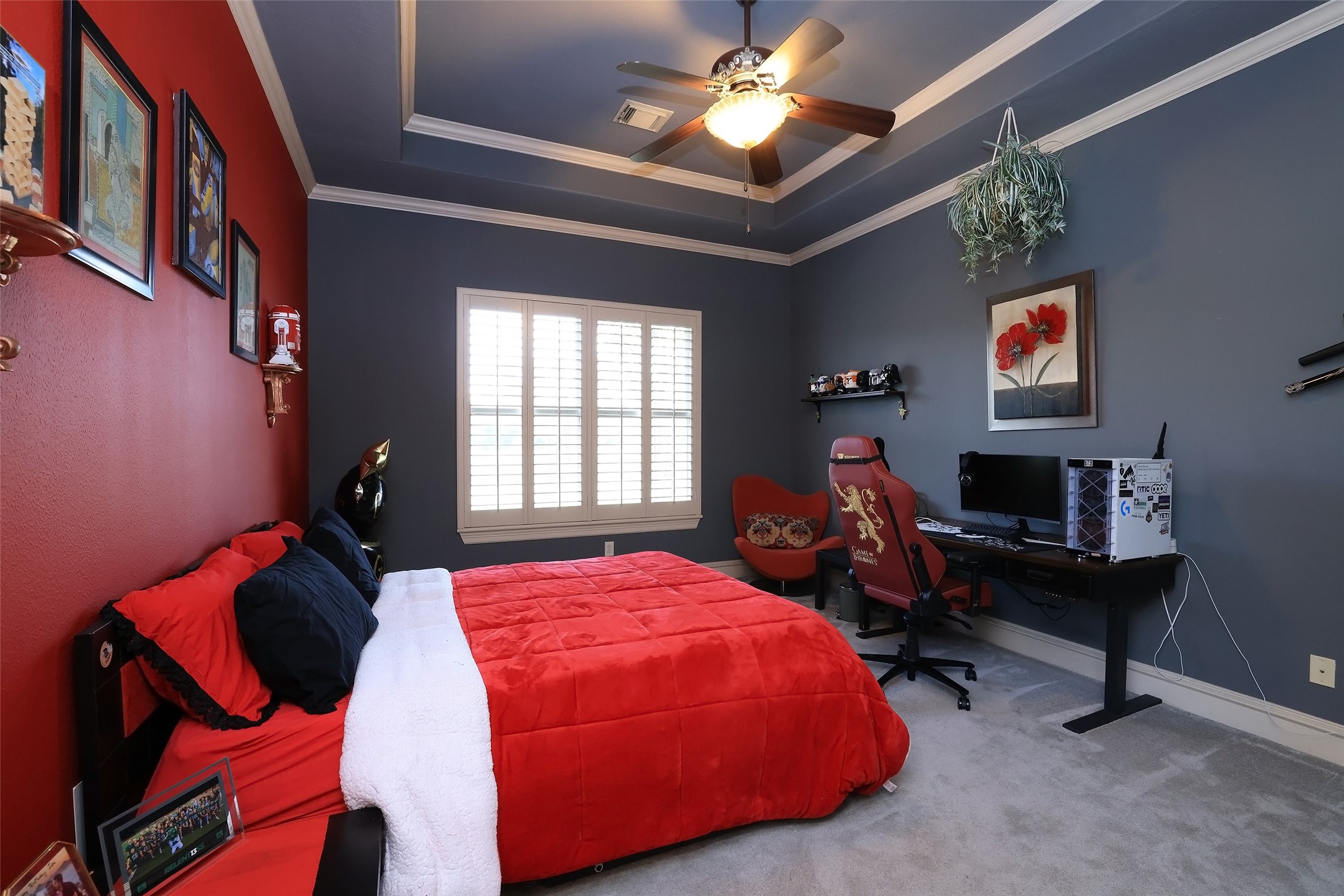 22 Post Shadow Estate Drive Spring, TX 77389 - Photo 36 of 50 a bedroom with a bed and a chandelier