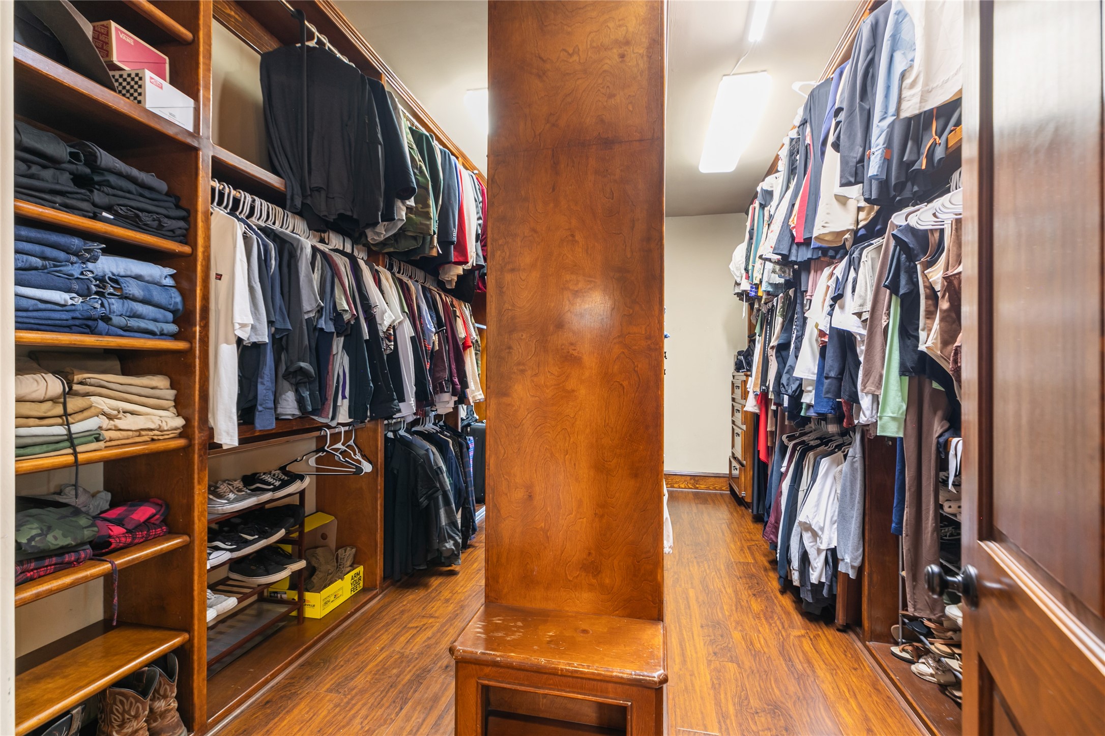 22 Post Shadow Estate Drive Spring, TX 77389 - Photo 37 of 50 Large primary closet with built-in shelves provides plenty of space for all your needs.