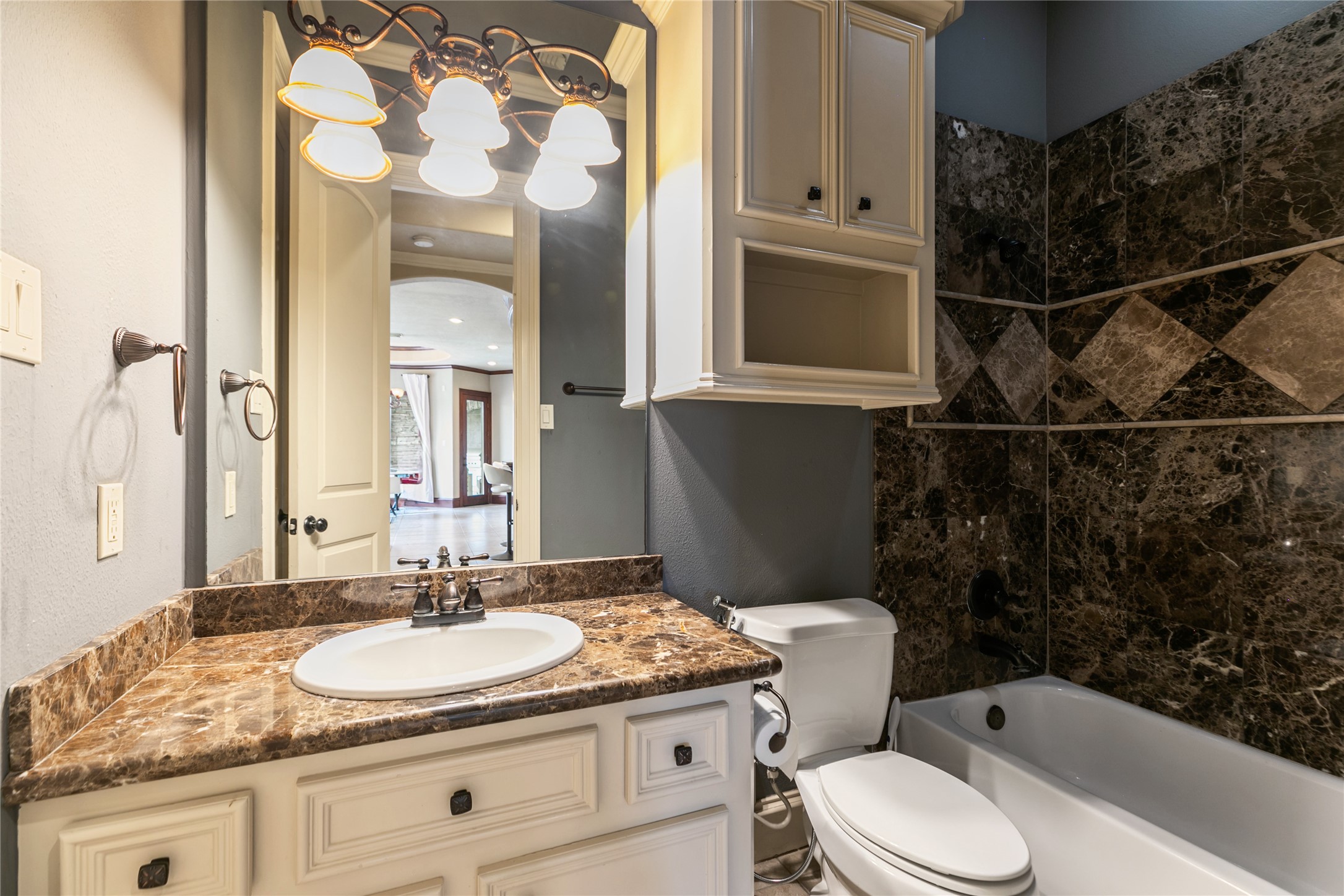 22 Post Shadow Estate Drive Spring, TX 77389 - Photo 39 of 50 Attractive downstairs secondary bathroom with granite counter and lovely tile shower.