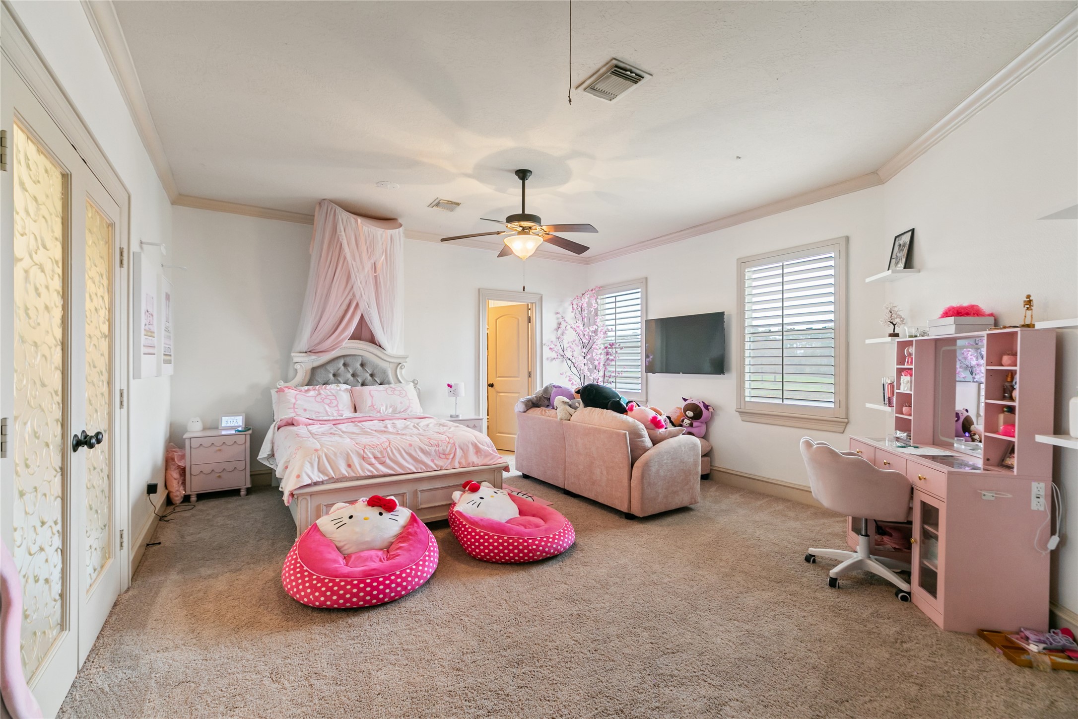 22 Post Shadow Estate Drive Spring, TX 77389 - Photo 44 of 50 Secondary upstairs bedroom with large windows with plantation shutters.