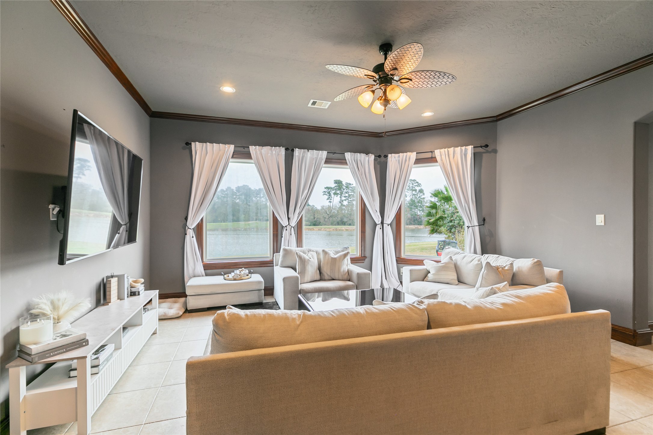22 Post Shadow Estate Drive Spring, TX 77389 - Photo 48 of 50 Light fills the large den in the attached apartment through windows overlooking the back yard.