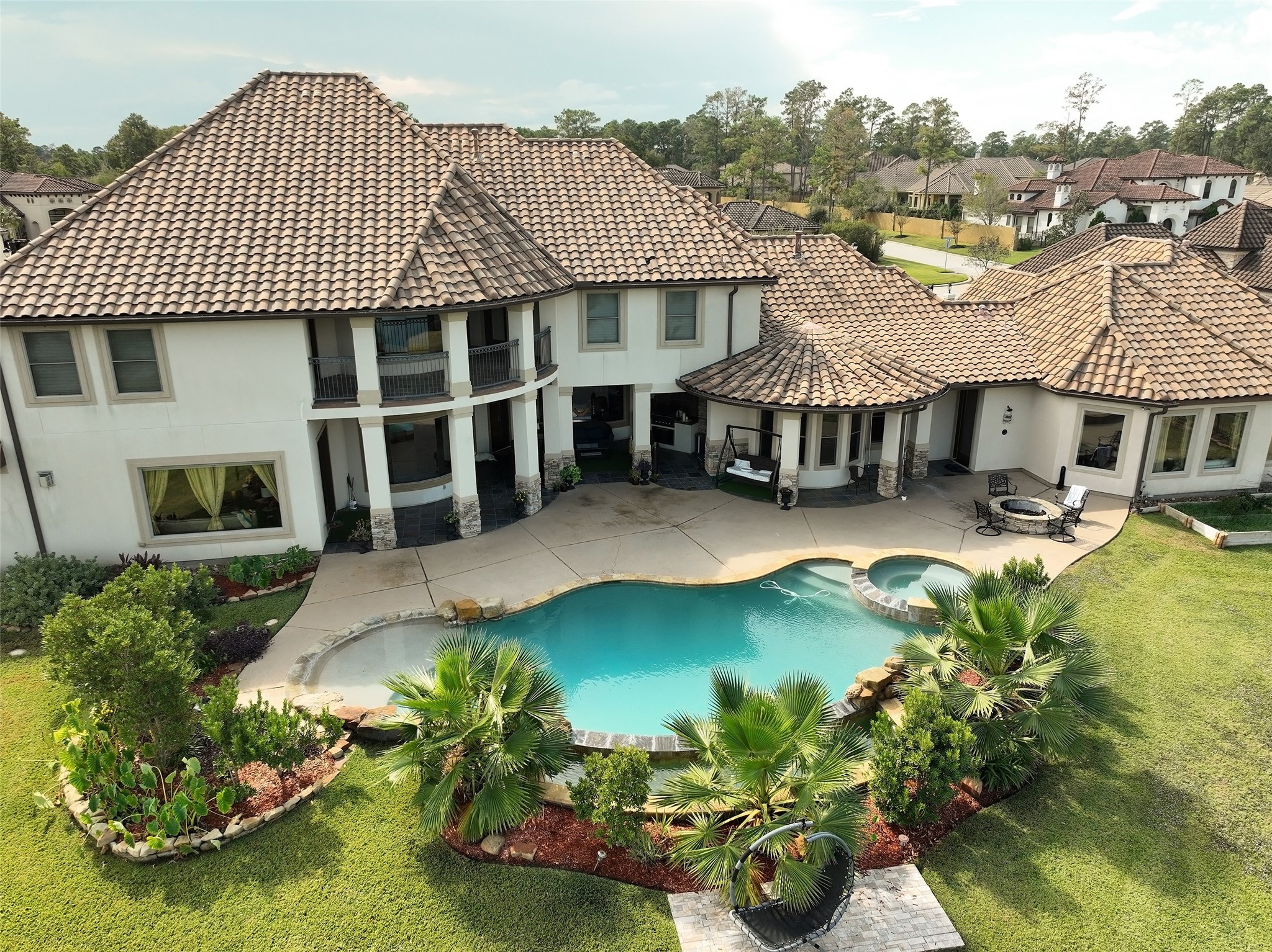 22 Post Shadow Estate Drive Spring, TX 77389 - Photo 9 of 50 a front view of a residential houses with yard and mountain view in back