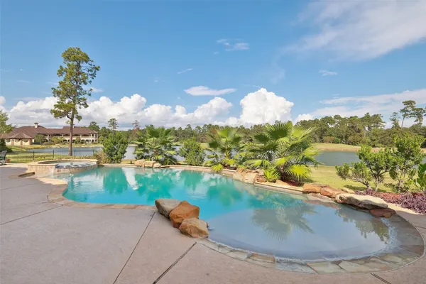 a view of a lake with a big yard