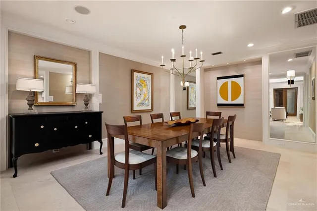 a view of a dining room and chandelier