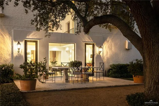 a view of swimming pool with outdoor seating