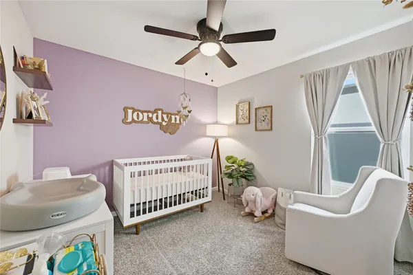 a bed room with a bed and a couch