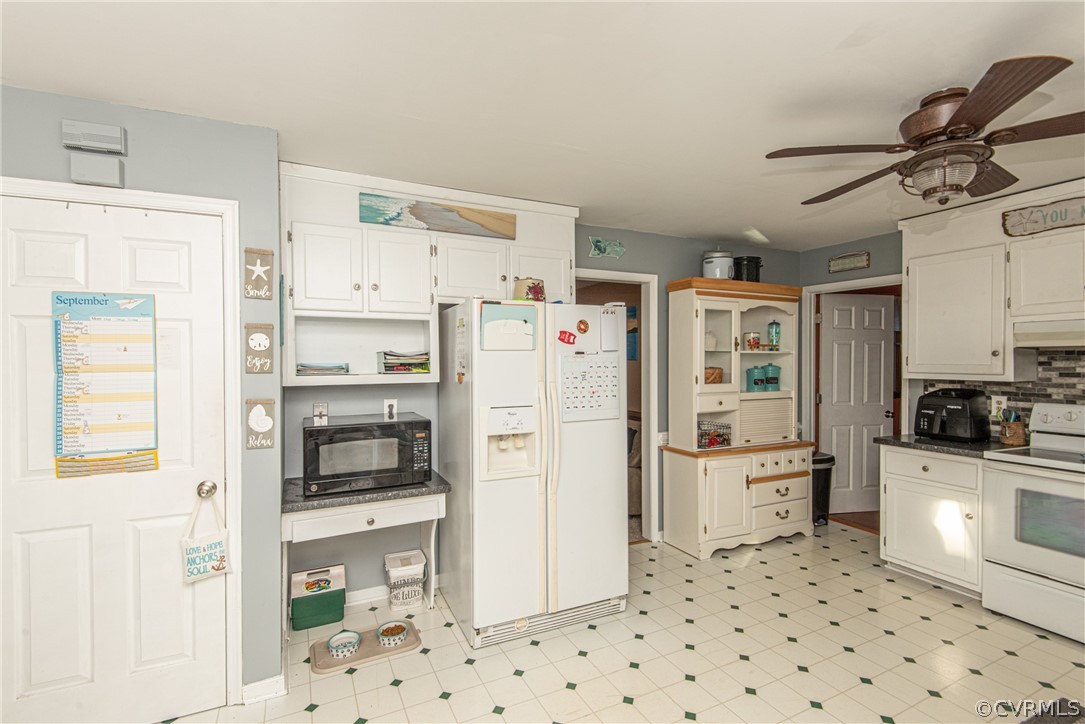 10719 Ridgerun Road Chesterfield, VA 23832 - Photo 11 of 26 a kitchen with stainless steel appliances a refrigerator sink and stove