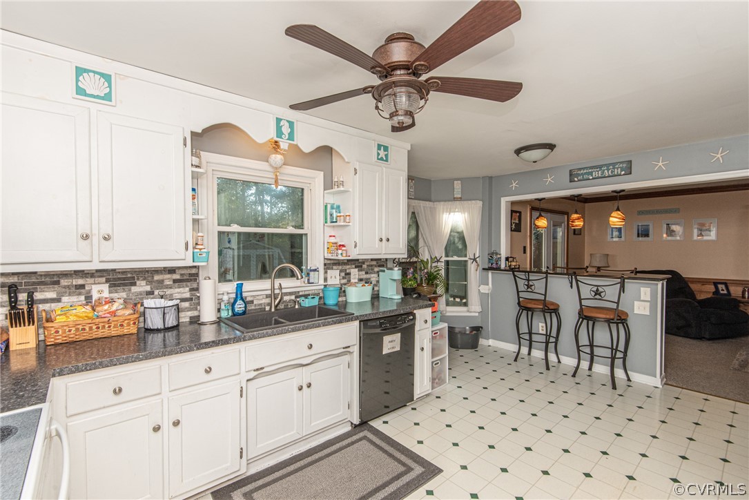 10719 Ridgerun Road Chesterfield, VA 23832 - Photo 12 of 26 a kitchen with a sink a stove and cabinets
