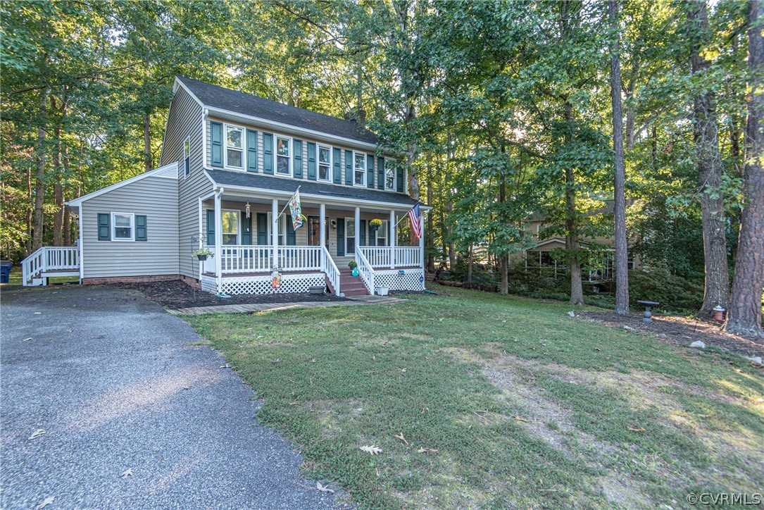 10719 Ridgerun Road Chesterfield, VA 23832 - Photo 2 of 26 front view of a house with a yard