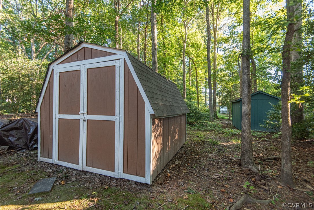 10719 Ridgerun Road Chesterfield, VA 23832 - Photo 26 of 26 a backyard of a house with lots of green space