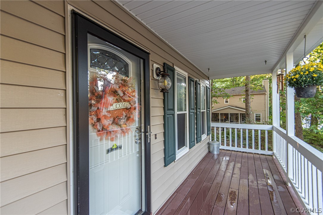 10719 Ridgerun Road Chesterfield, VA 23832 - Photo 4 of 26 a view of a porch with wooden floor and outdoor space