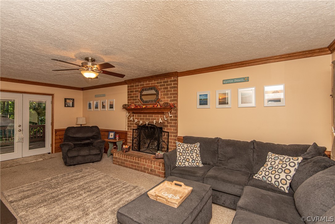 10719 Ridgerun Road Chesterfield, VA 23832 - Photo 5 of 26 a living room with furniture and a fireplace