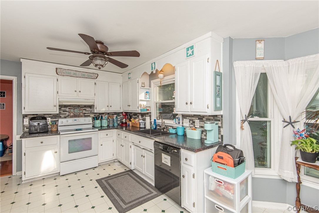 10719 Ridgerun Road Chesterfield, VA 23832 - Photo 10 of 26 a kitchen with stainless steel appliances kitchen island granite countertop a sink and cabinets