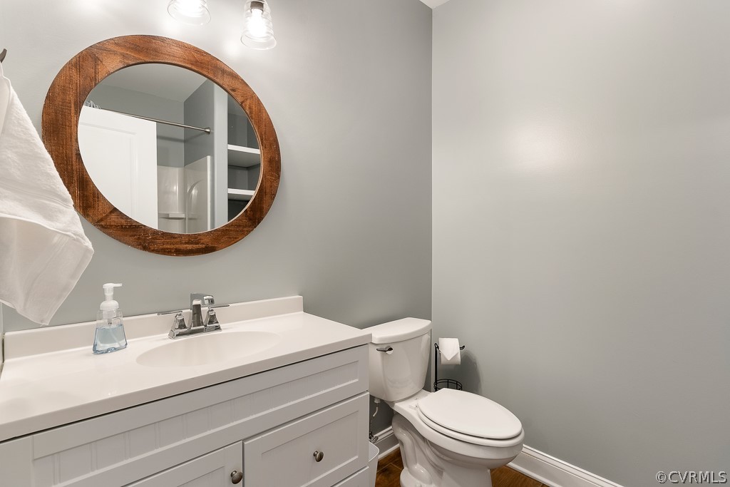 3812 Millmount Drive Powhatan, VA 23139 - Photo 37 of 48 a bathroom with a sink and a mirror