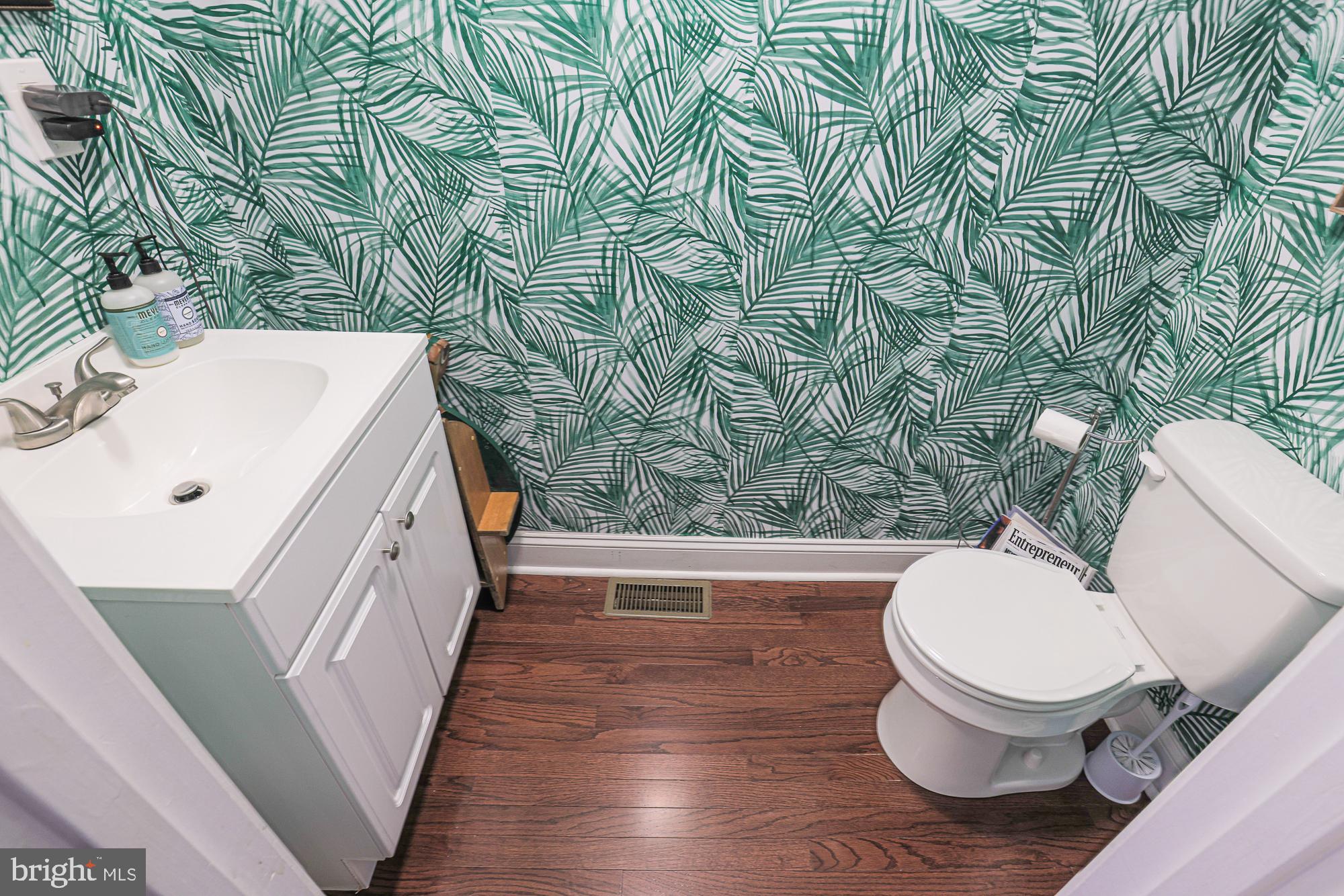 1446 Hull Street Baltimore, MD 21230 - Photo 26 of 54 a bathroom with a toilet and a sink