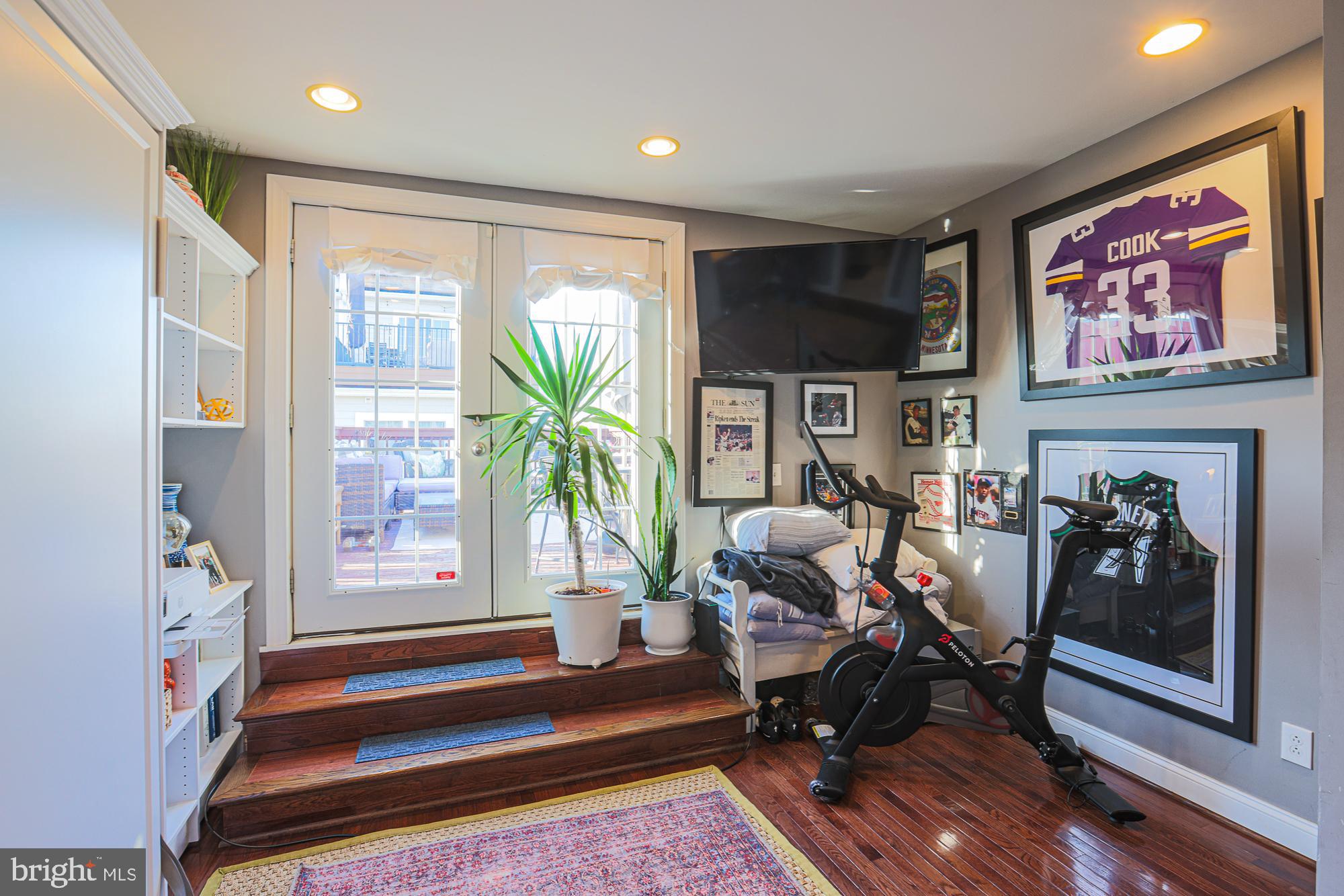 1446 Hull Street Baltimore, MD 21230 - Photo 47 of 54 a living room with furniture and a floor to ceiling window
