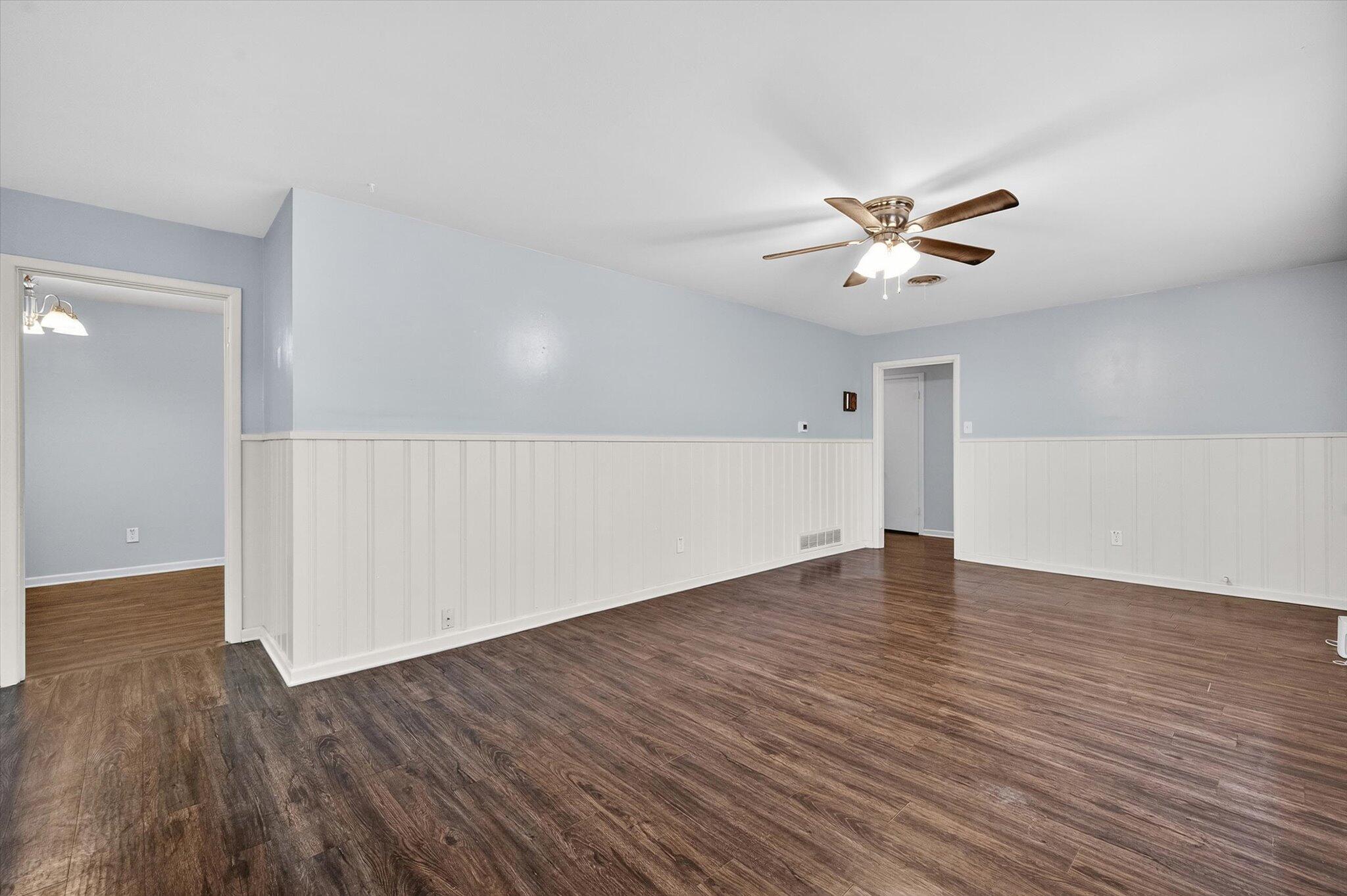 4915 17th Street Lubbock, TX 79416 - Photo 16 of 29 a view of an empty room with wooden floor