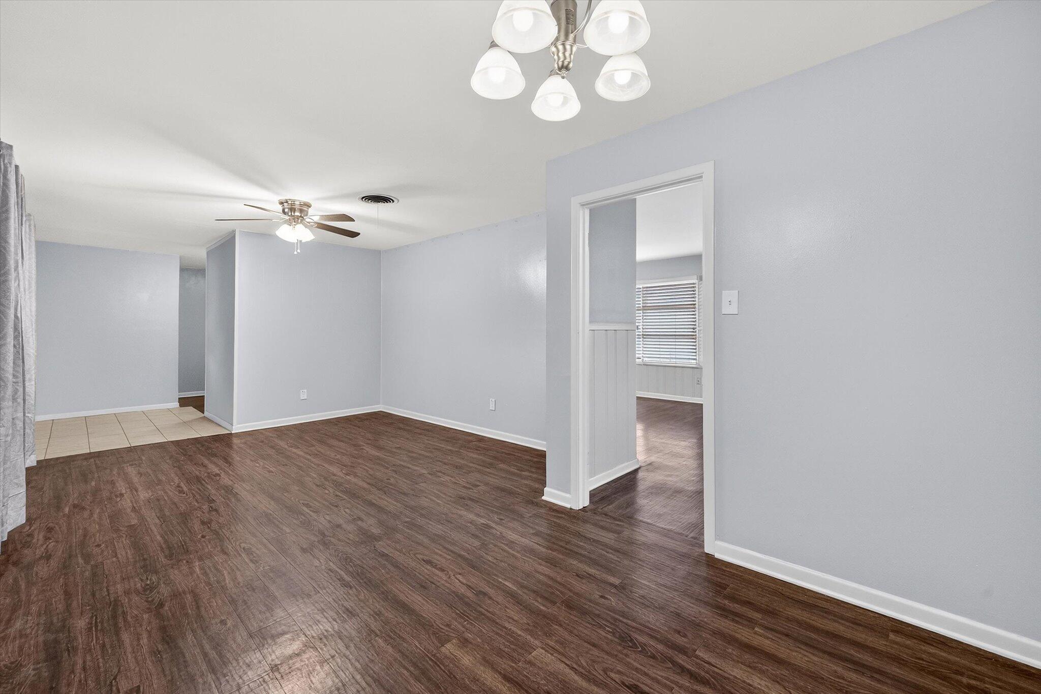 4915 17th Street Lubbock, TX 79416 - Photo 22 of 29 a view of an empty room with wooden floor