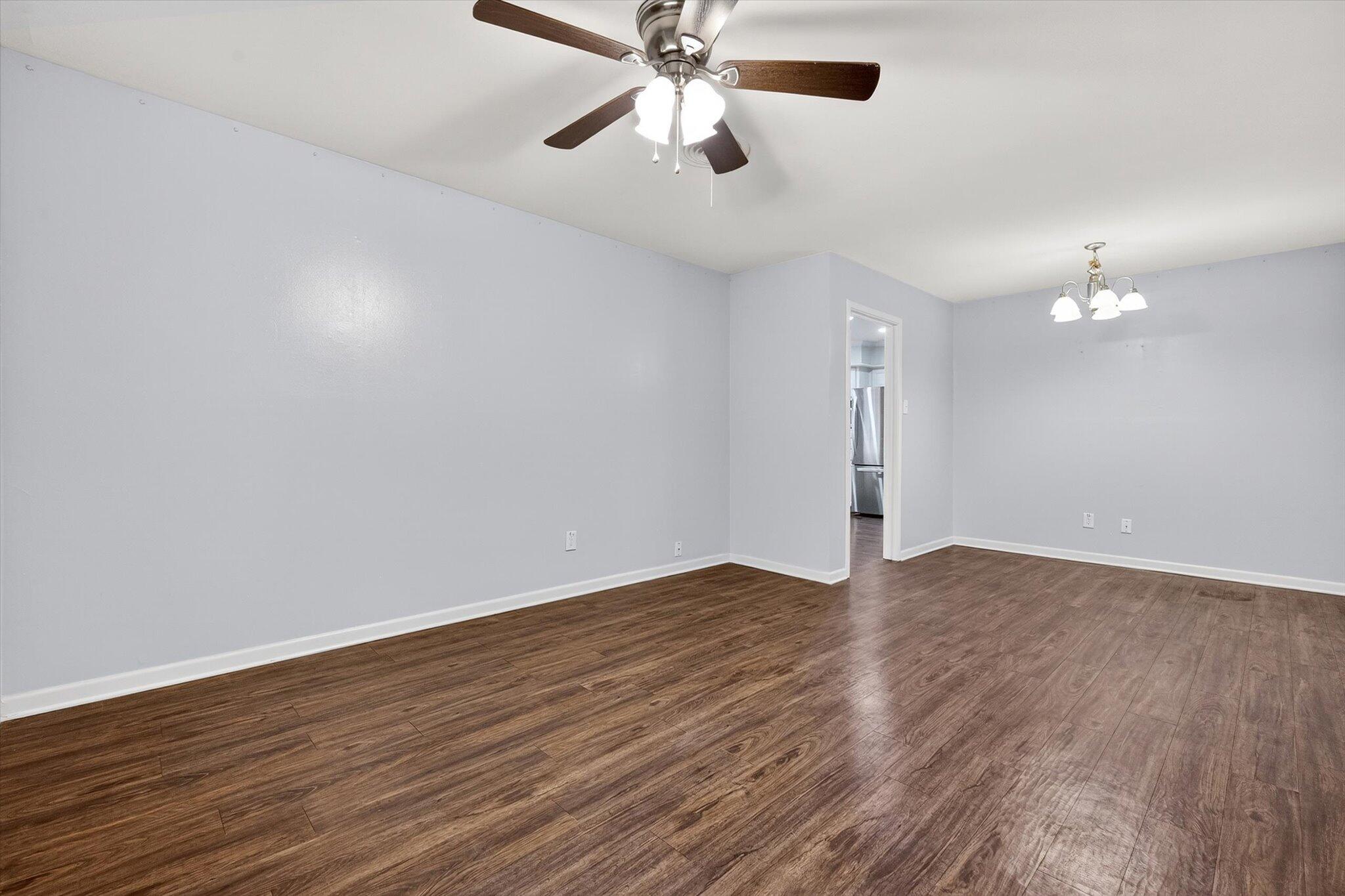 4915 17th Street Lubbock, TX 79416 - Photo 24 of 29 a view of an empty room with wooden floor