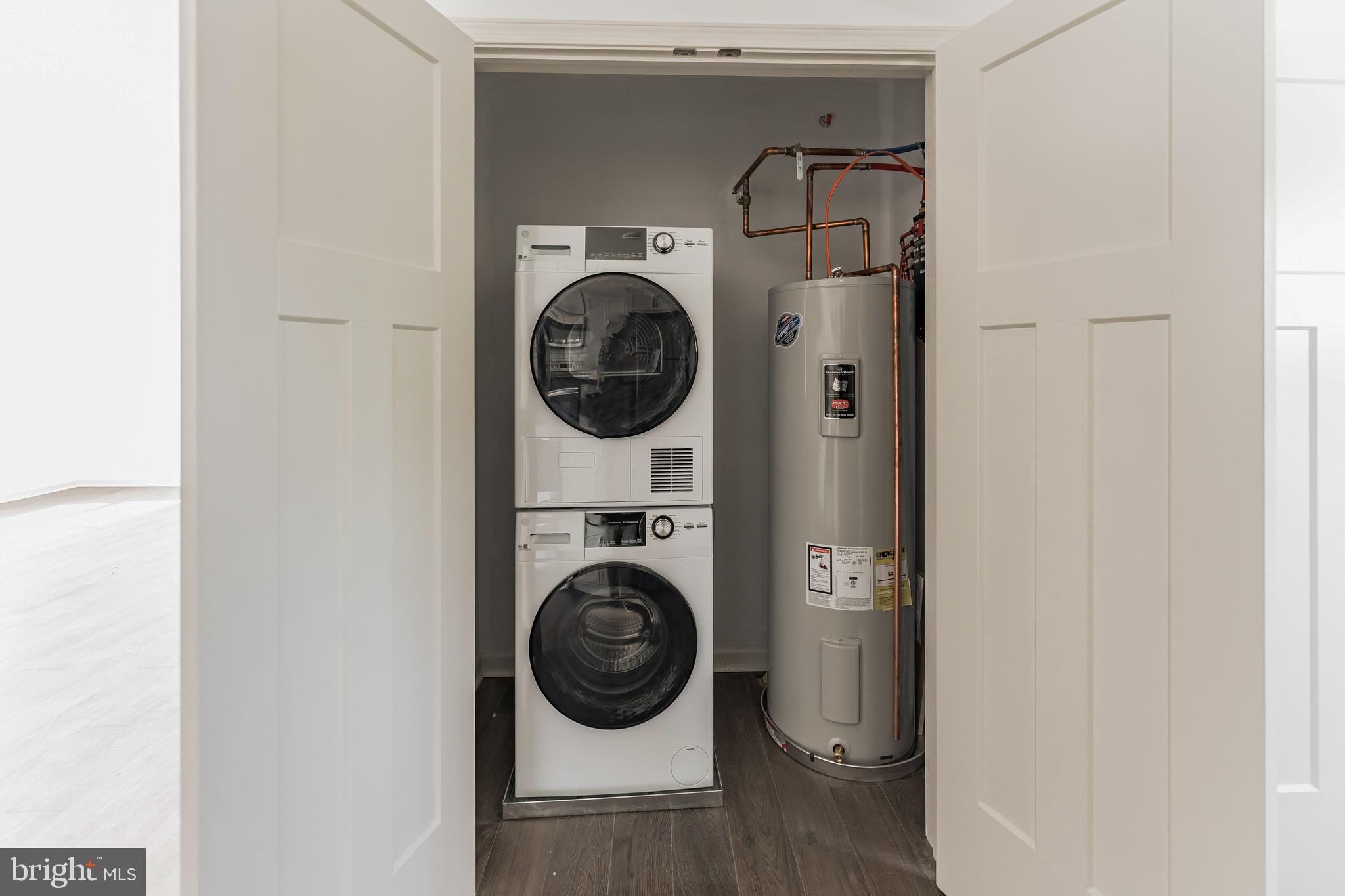 7105 Ridge Avenue, Unit A3 Philadelphia, PA 19128 - Photo 9 of 10 a utility room with dryer and washer