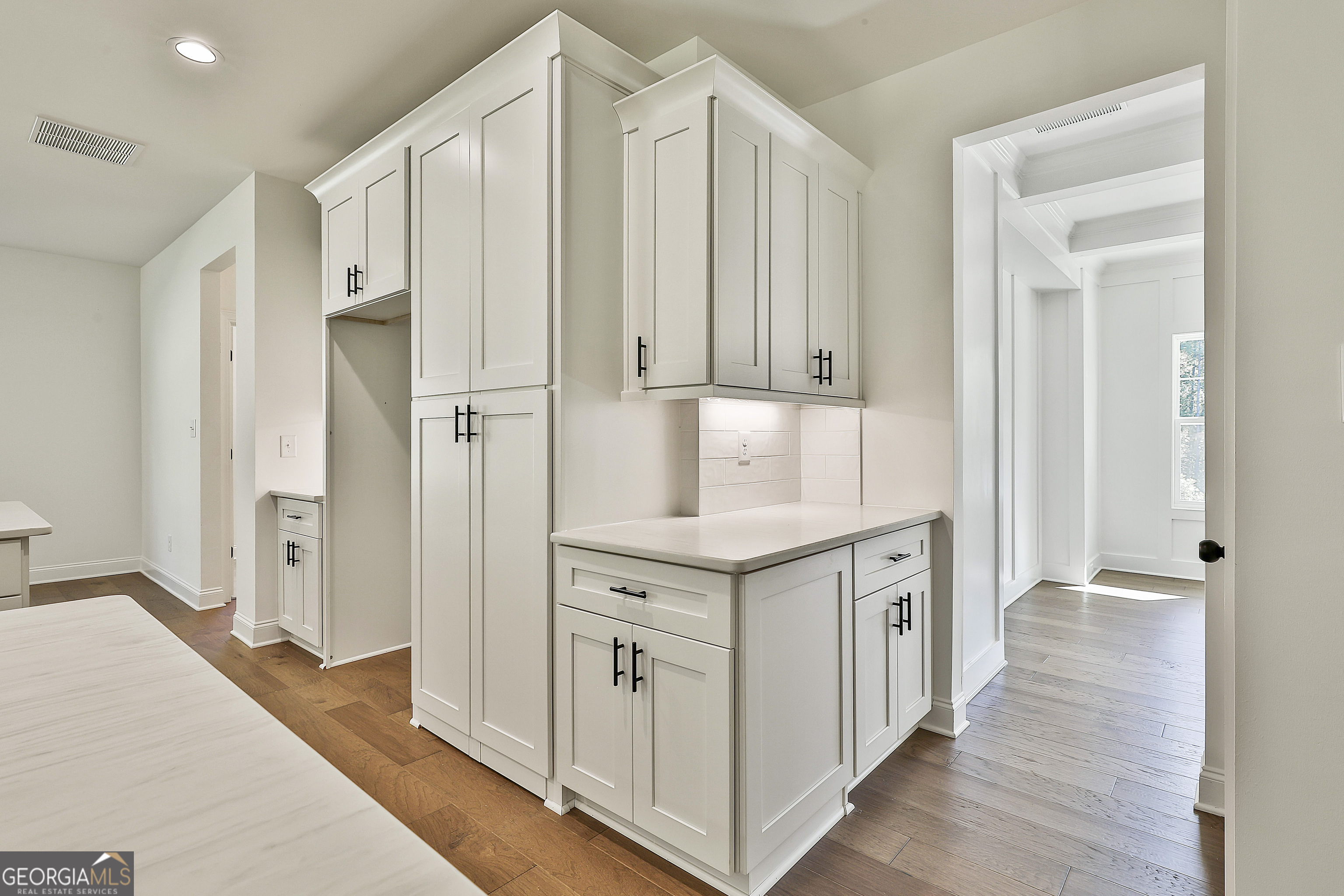 766 Wisteria Lane, Unit 55 Williamson, GA 30292 - Photo 18 of 52 a kitchen with stainless steel appliances a stove and a refrigerator