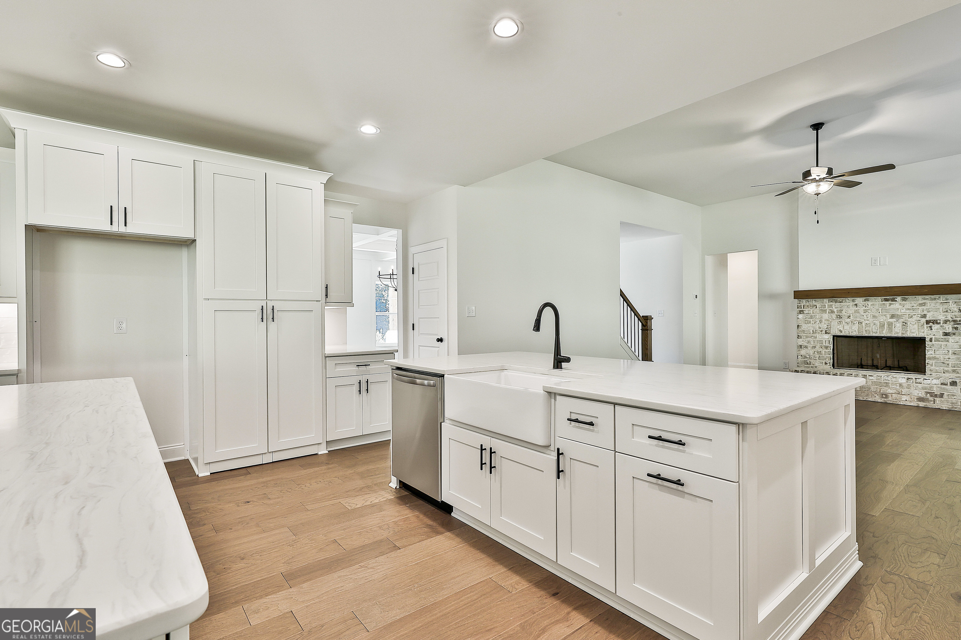 766 Wisteria Lane, Unit 55 Williamson, GA 30292 - Photo 21 of 52 a spacious bathroom with a double vanity sink a mirror and a shower