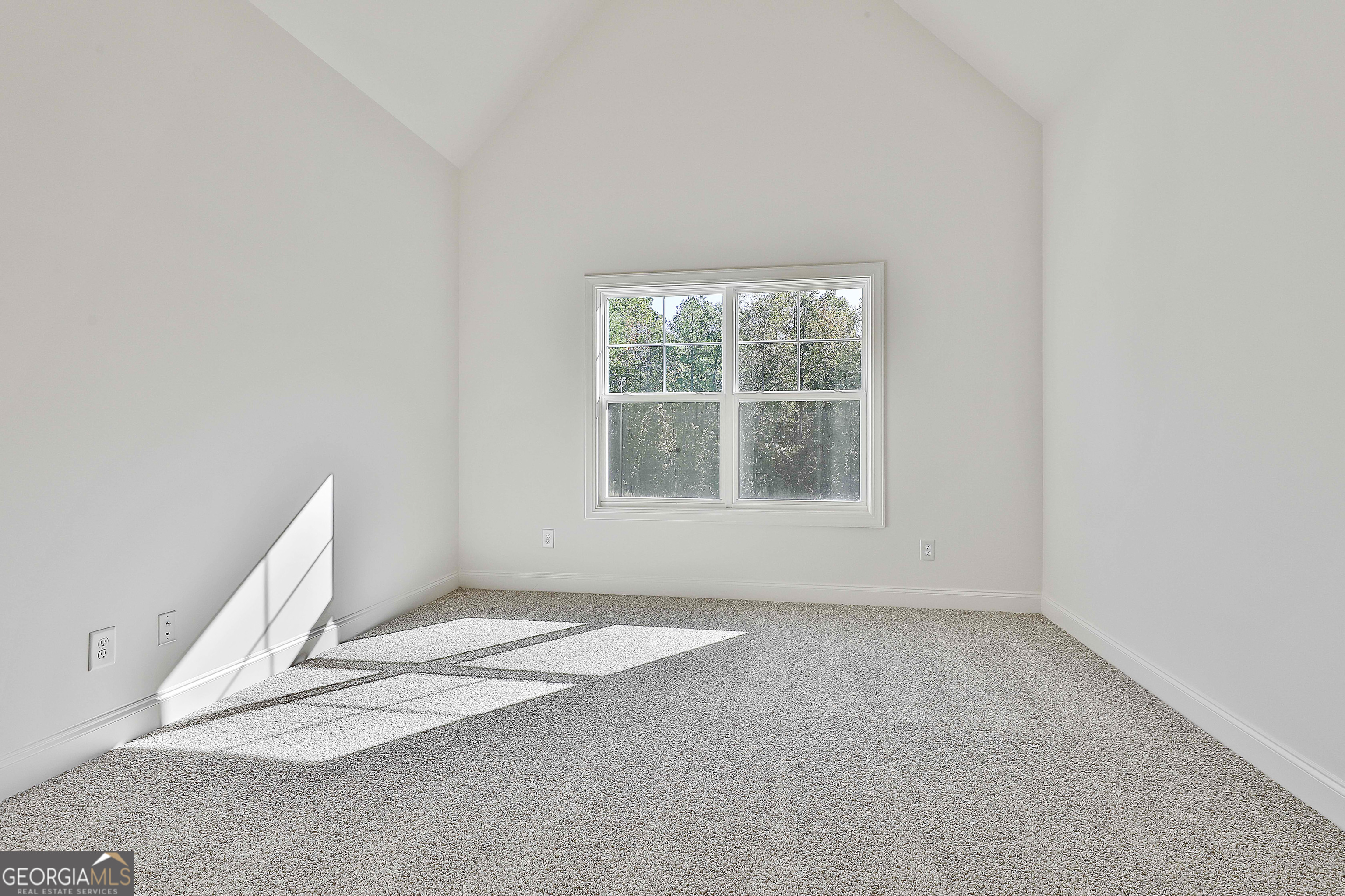 766 Wisteria Lane, Unit 55 Williamson, GA 30292 - Photo 36 of 52 an empty room with a window