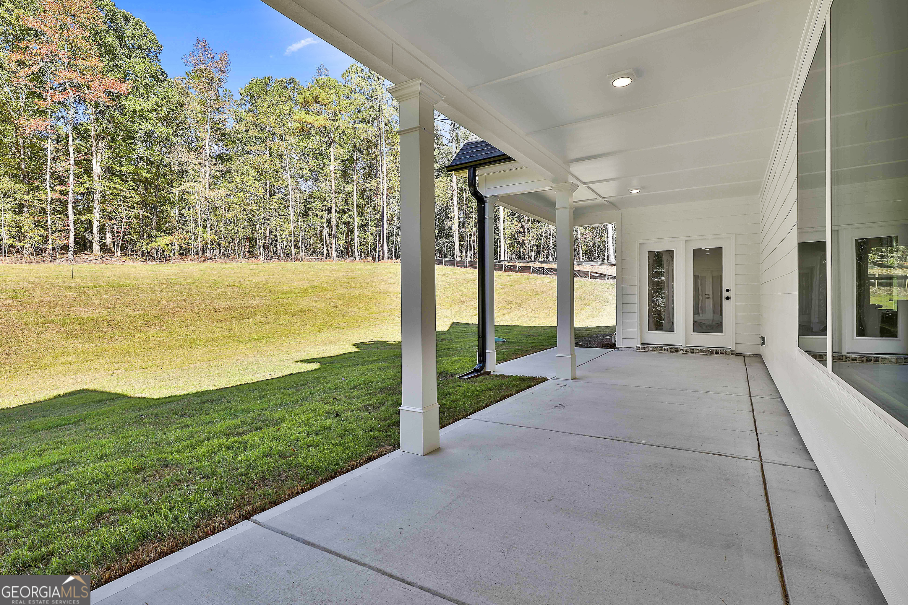766 Wisteria Lane, Unit 55 Williamson, GA 30292 - Photo 50 of 52 a view of an ocean with a swimming pool