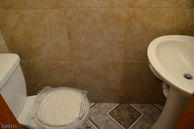 a bathroom with a tub and a shower