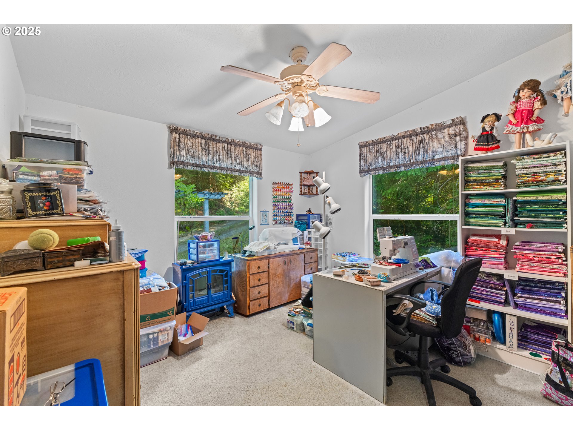 57418 Woodland Road Coquille, OR 97423 - Photo 24 of 39 a view of a dining room with furniture window and outside view