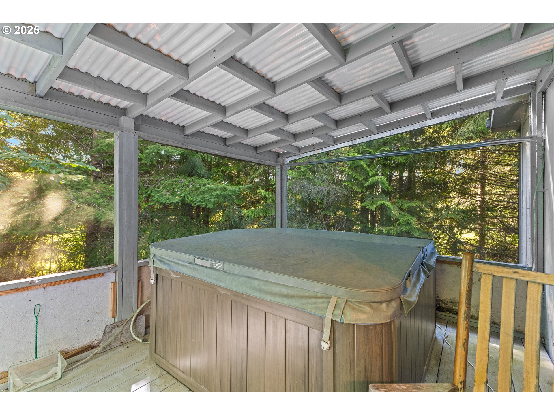57418 Woodland Road Coquille, OR 97423 - Photo 30 of 39 a view of a patio with table and chairs