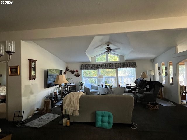 57418 Woodland Road Coquille, OR 97423 - Photo 3 of 39 a bedroom with furniture a large window and a chandelier