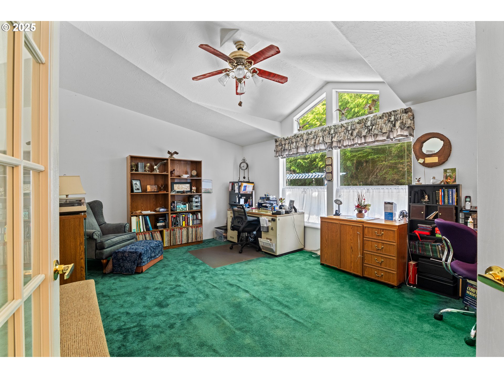 57418 Woodland Road Coquille, OR 97423 - Photo 31 of 39 a living room with furniture and a large window