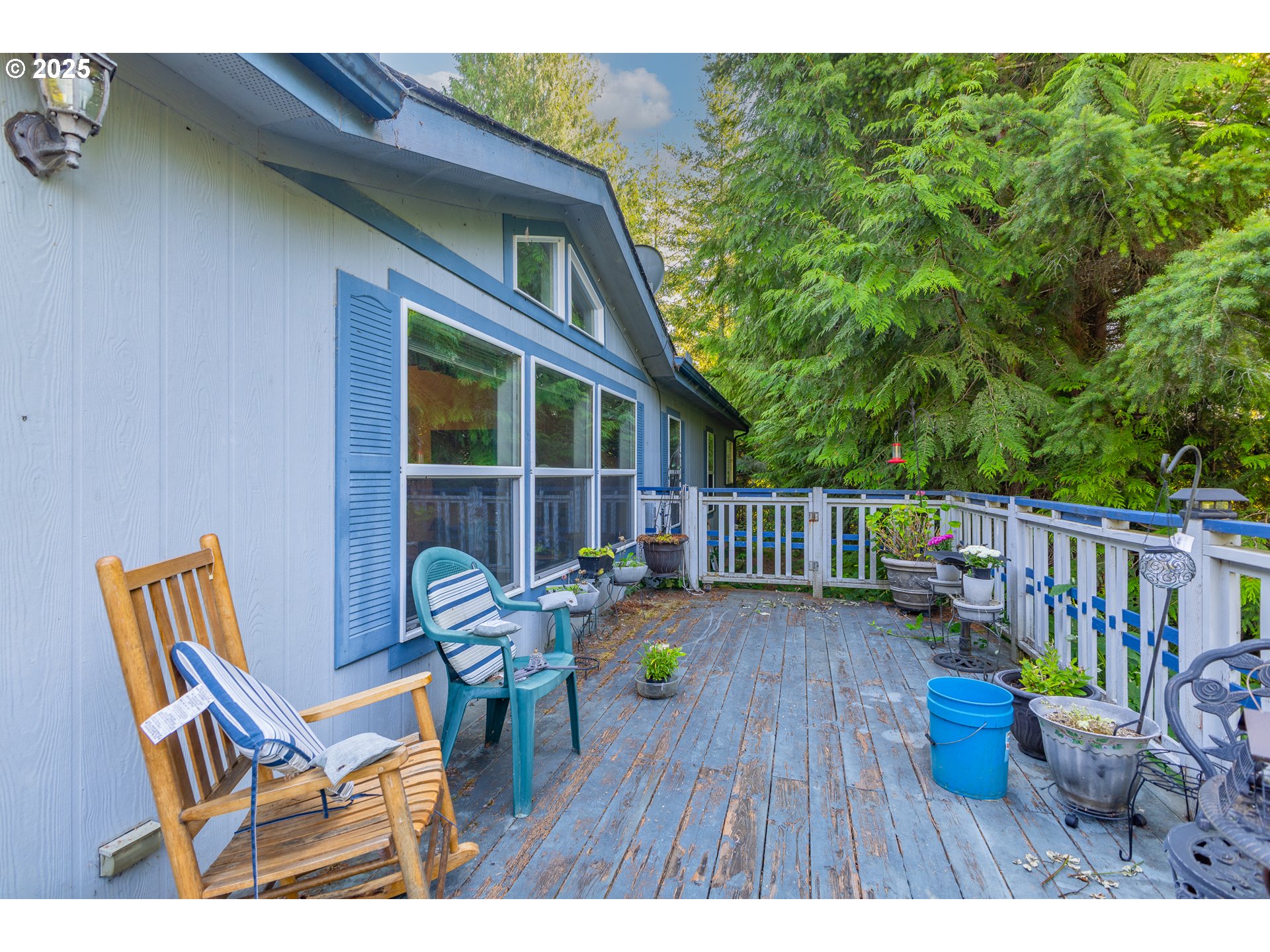 57418 Woodland Road Coquille, OR 97423 - Photo 32 of 39 a view of sitting area with furniture on wooden deck