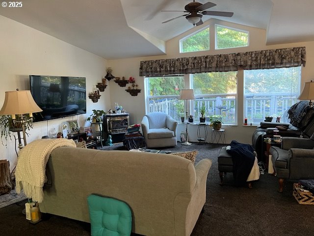 57418 Woodland Road Coquille, OR 97423 - Photo 4 of 39 a living room with furniture and a flat screen tv