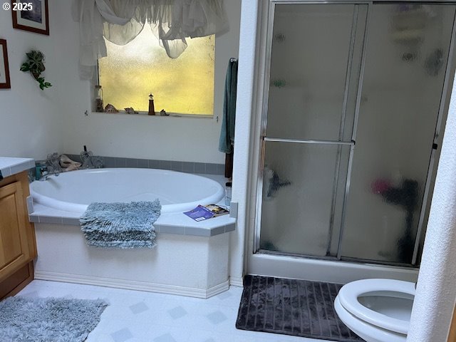 57418 Woodland Road Coquille, OR 97423 - Photo 10 of 39 a bathroom with a tub and a potted plant