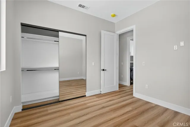 a bathroom with a toilet sink and shower