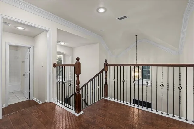 a view of a hallway with a livingroom