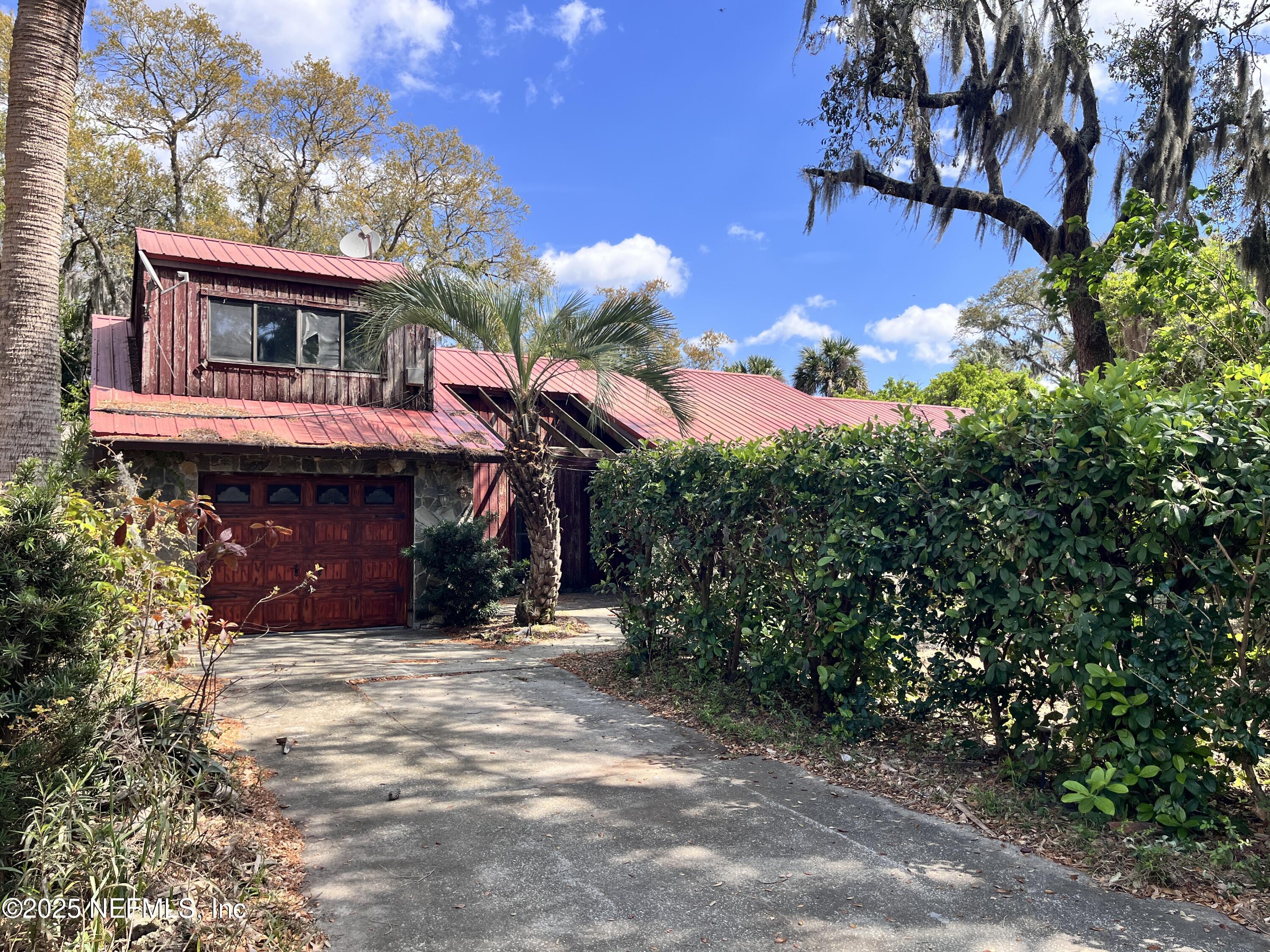 5511 Heckscher Drive Jacksonville, FL 32226 - Photo 1 of 19 a view of a house with a yard