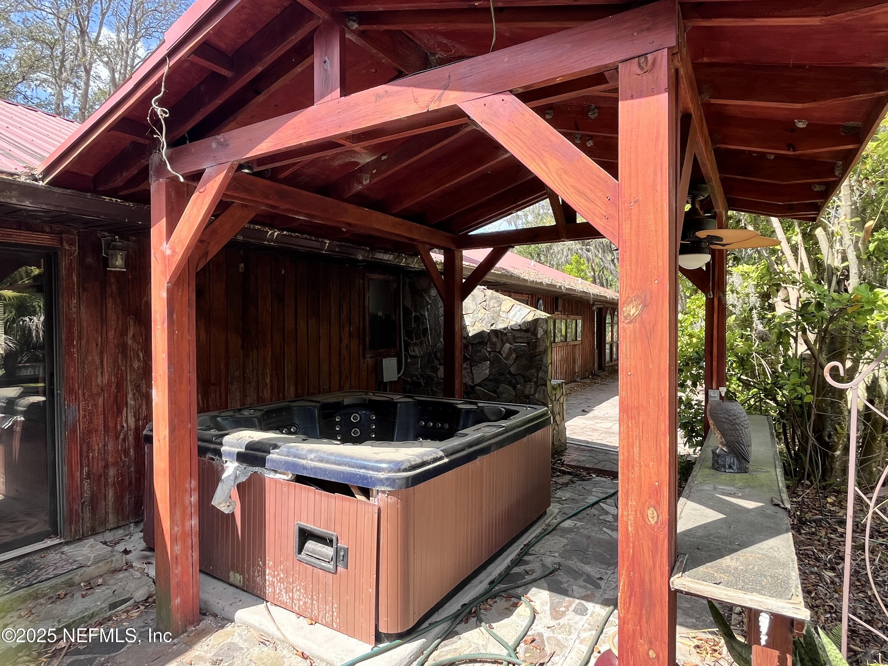 5511 Heckscher Drive Jacksonville, FL 32226 - Photo 7 of 19 a view of outdoor kitchen and outdoor seating