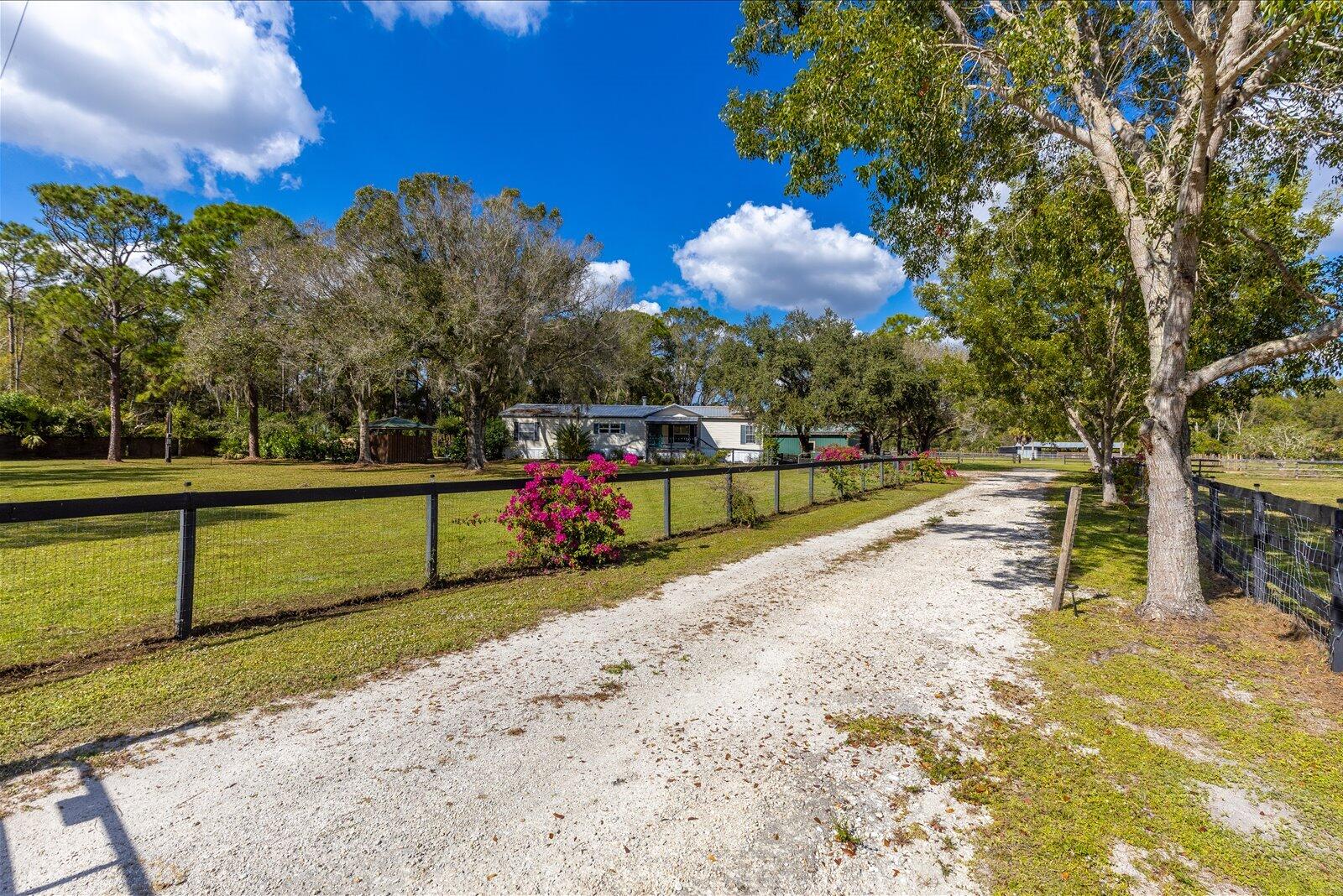 23801 Southwest Martin Highway Okeechobee, FL 34974 - Photo 2 of 85 a view of a park with large trees