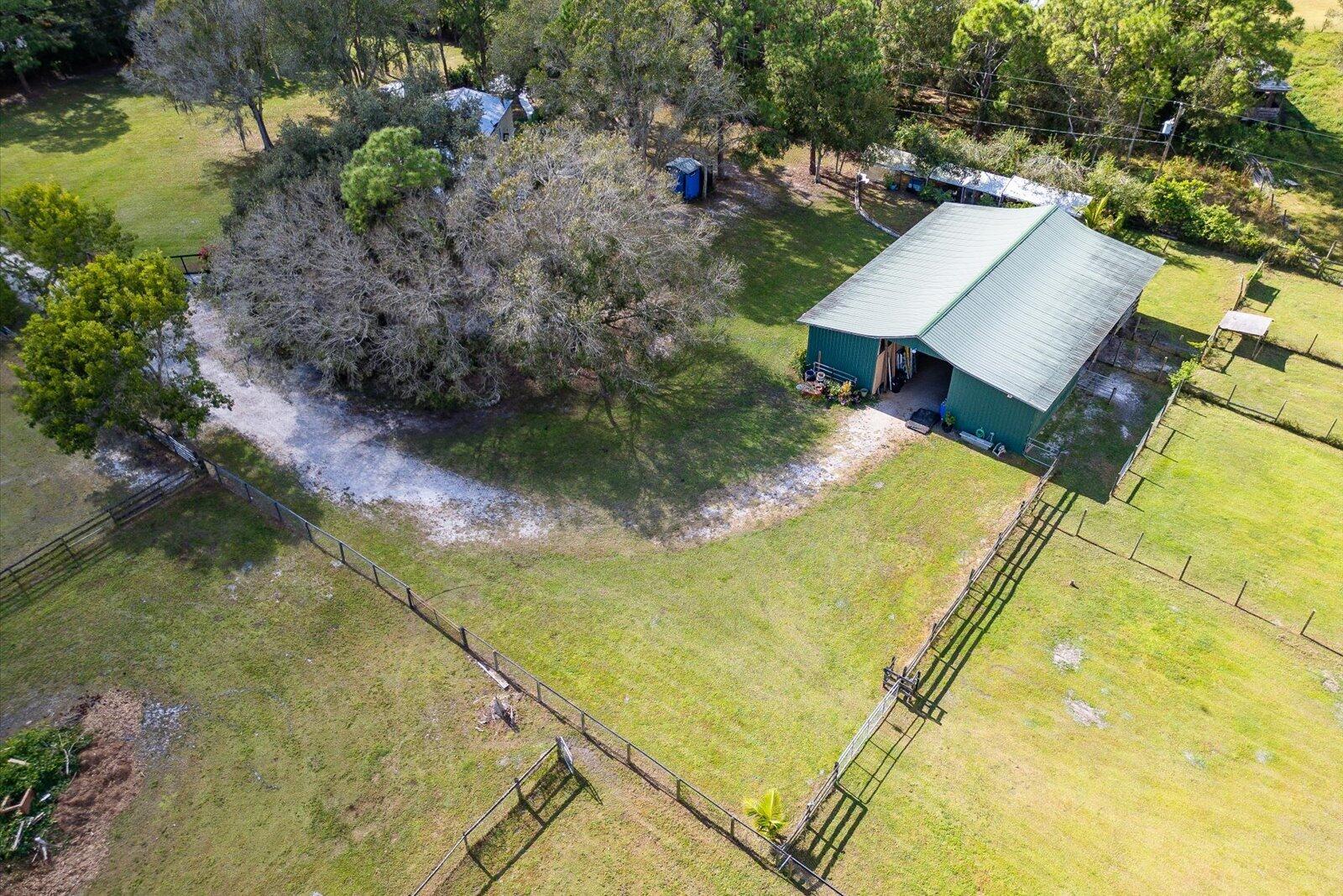 23801 Southwest Martin Highway Okeechobee, FL 34974 - Photo 23 of 85 a view of a yard with plants