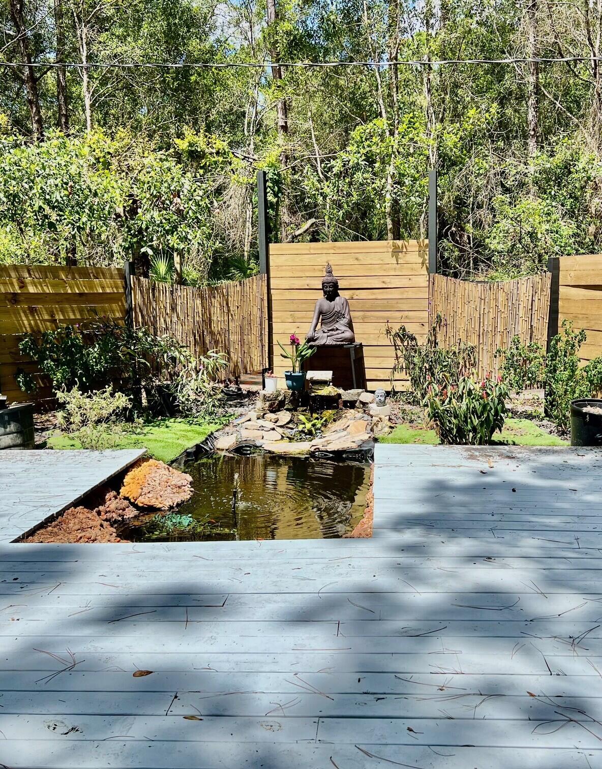 23801 Southwest Martin Highway Okeechobee, FL 34974 - Photo 41 of 85 a view of swimming pool with lawn chairs and wooden fence