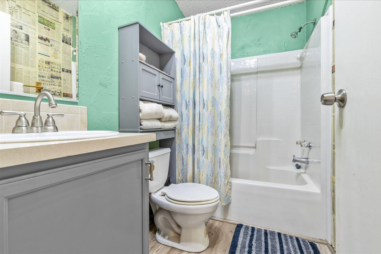 23801 Southwest Martin Highway Okeechobee, FL 34974 - Photo 64 of 85 a bathroom with a sink a toilet and shower