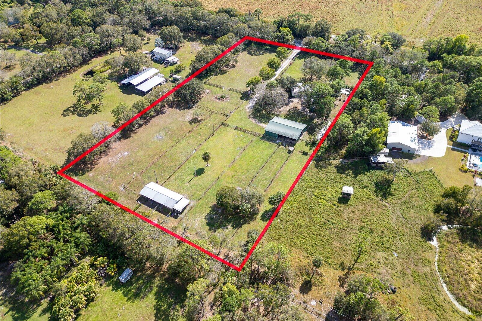 23801 Southwest Martin Highway Okeechobee, FL 34974 - Photo 79 of 85 an aerial view of a house