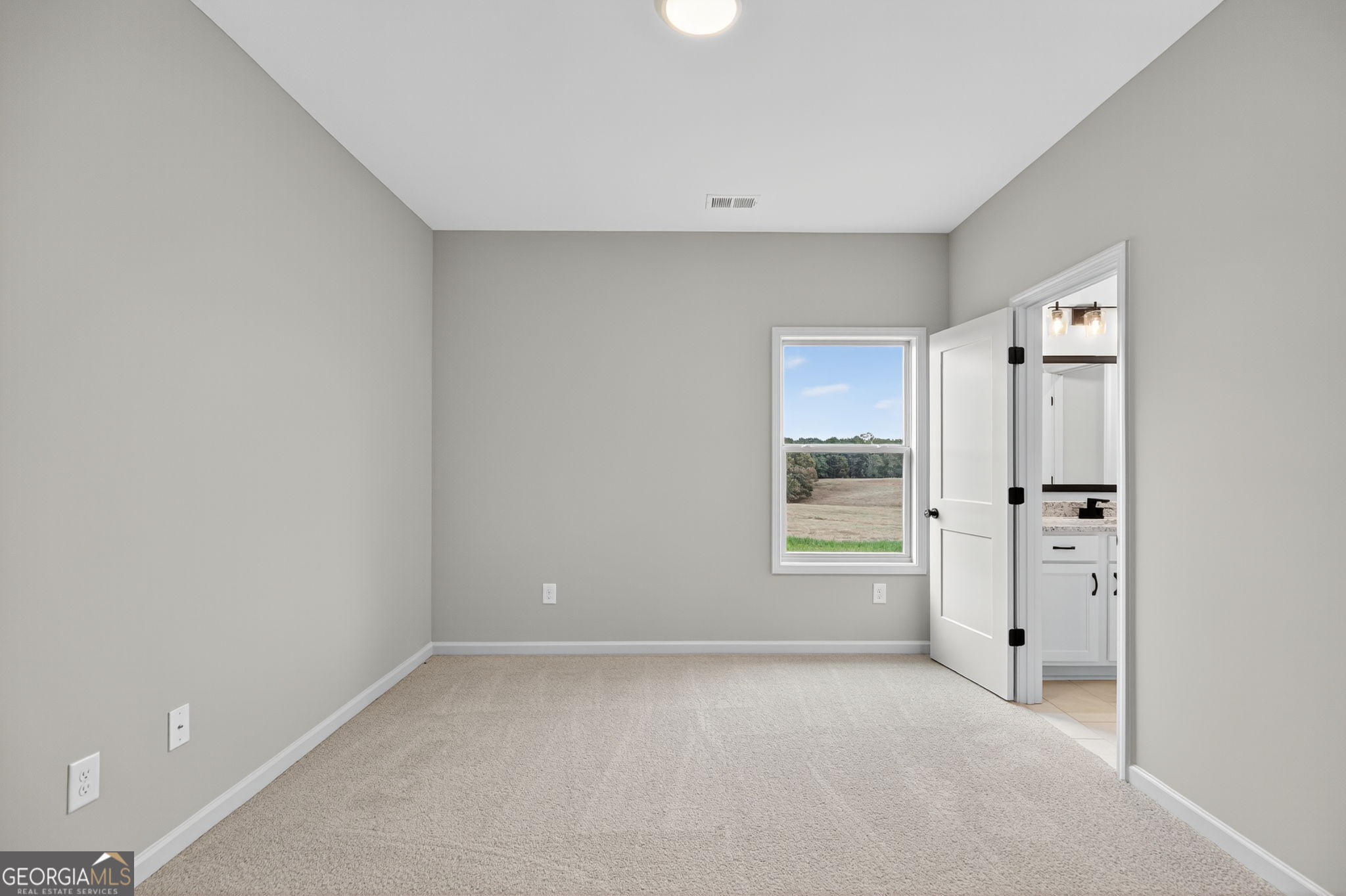 359 Gray Road Roopville, GA 30170 - Photo 36 of 46 a view of an empty room with a window